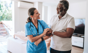 Professional caregiver delivering round-the-clock homecare support for seniors.